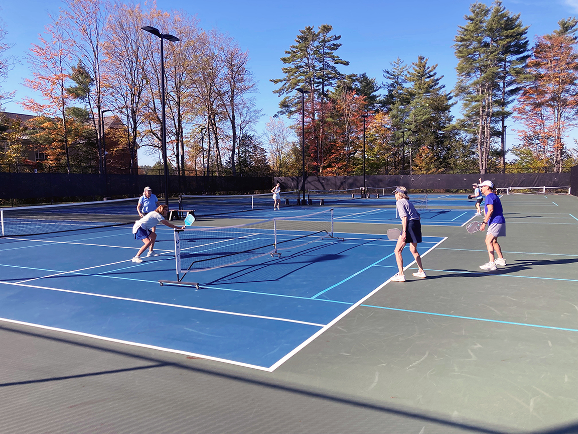 members playing pickleball